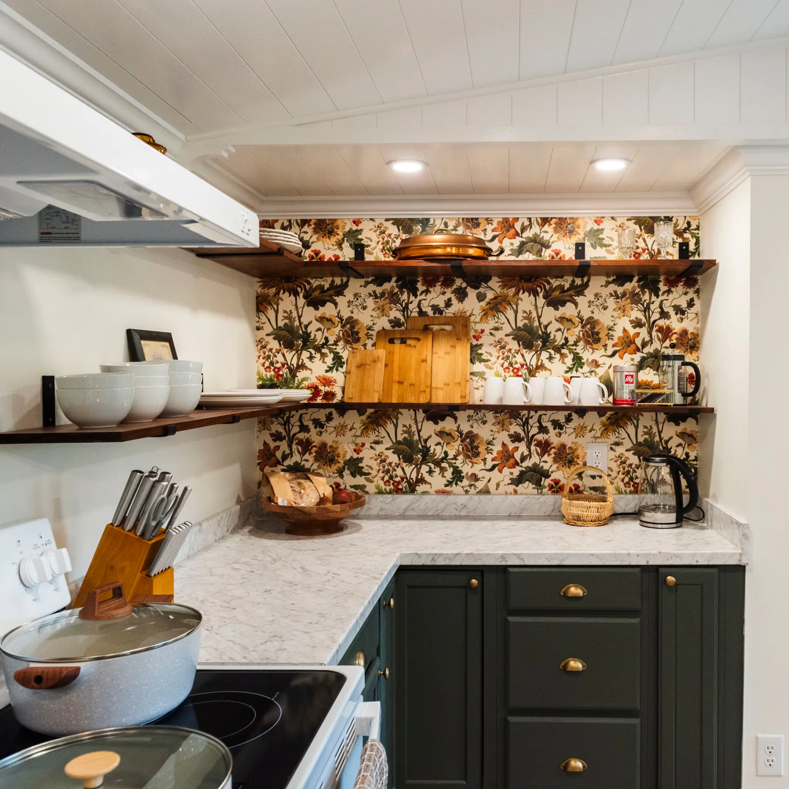 Finished kitchen remodel with custom cabinetry and tile backsplash