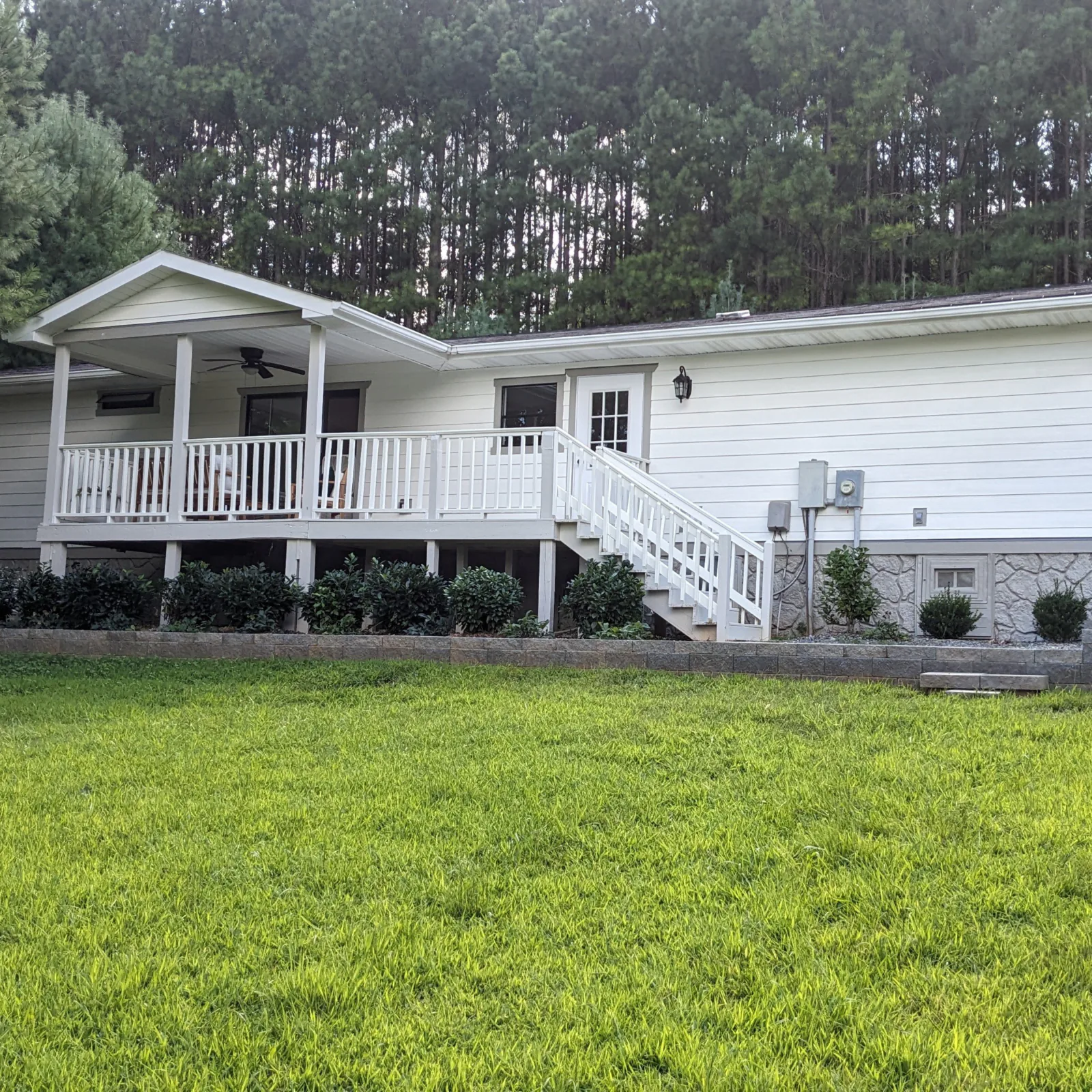 Close-up of wood-look lap siding with clean corner trim and even reveals